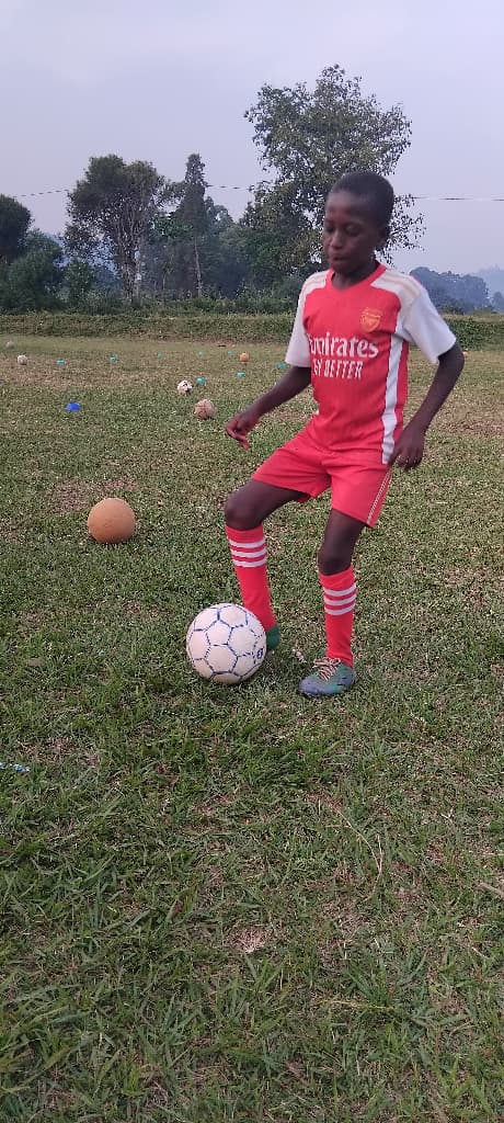 Youth football players in active training