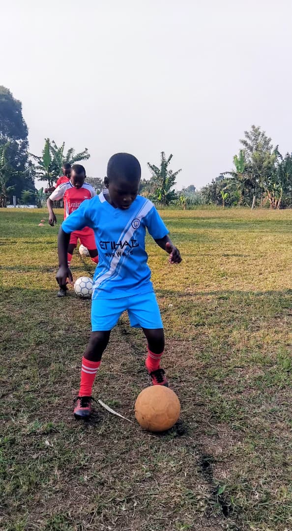 Football on field during youth practice